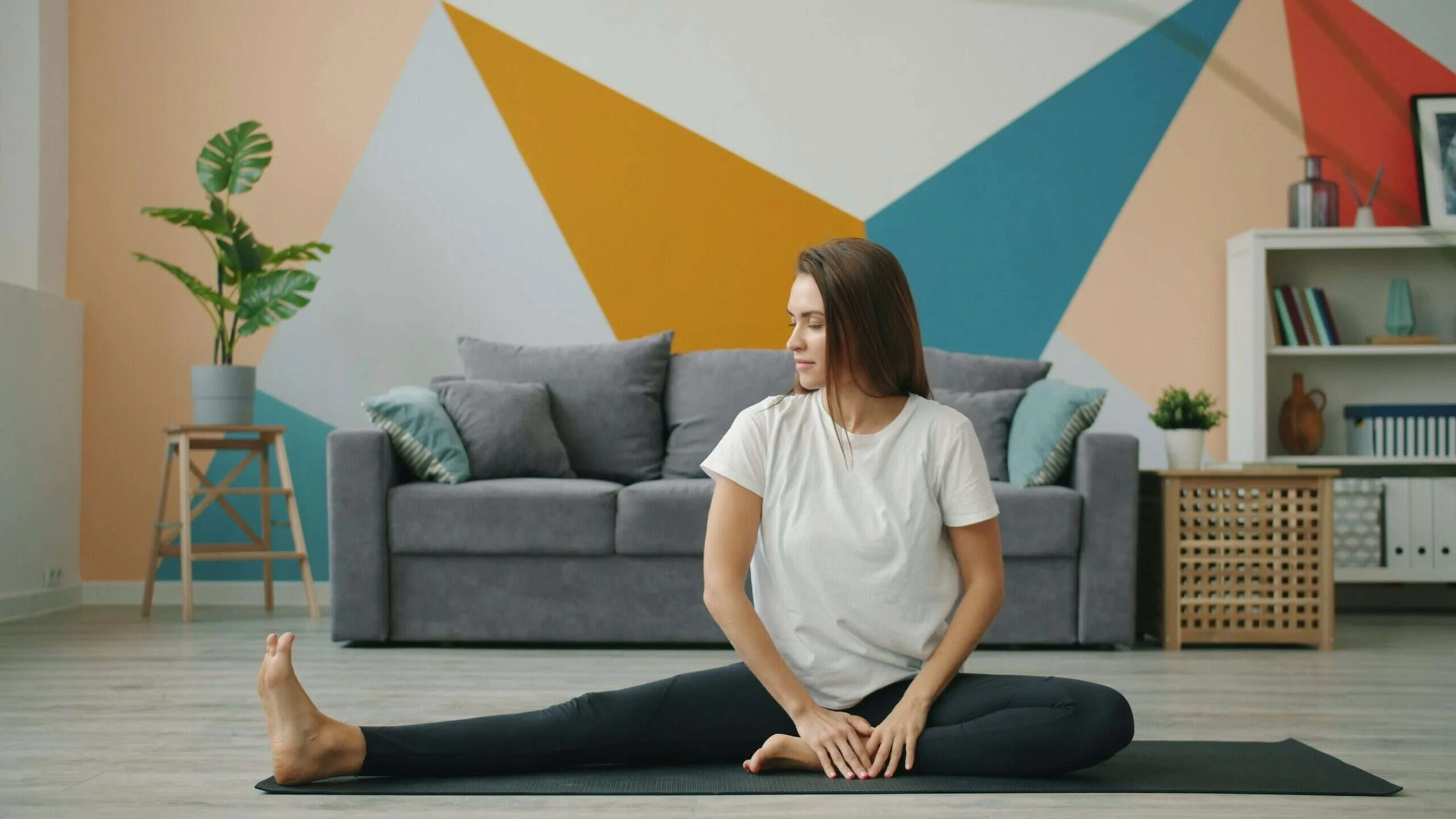 Person practising everyday mobility and stretching at home